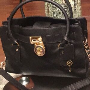 Michael Kora Black Leather Handbag with Gold Accents